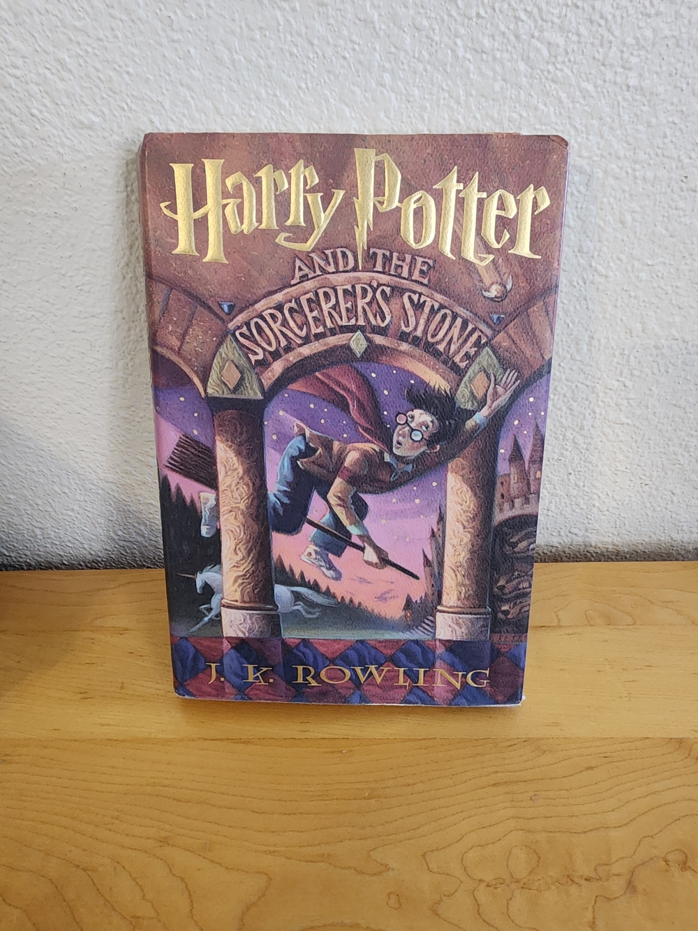 Harry Potter and the Sorcerer's Stone by J.K. Rowling - Purple Cover